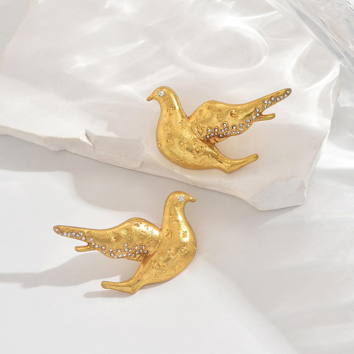 Feathered Glide Earrings