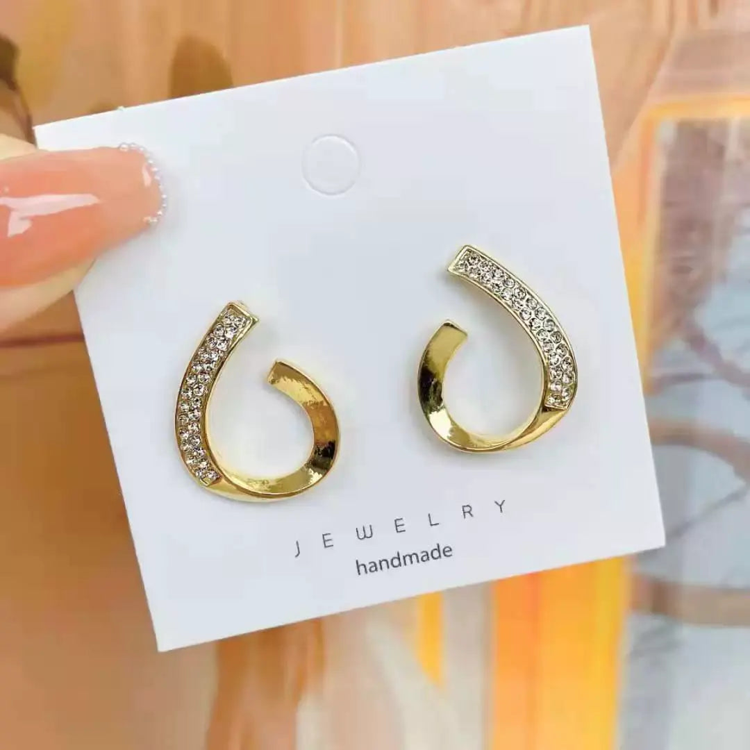 Gleam Curve Studs