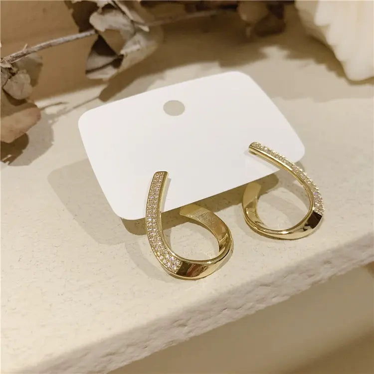 Gleam Curve Studs
